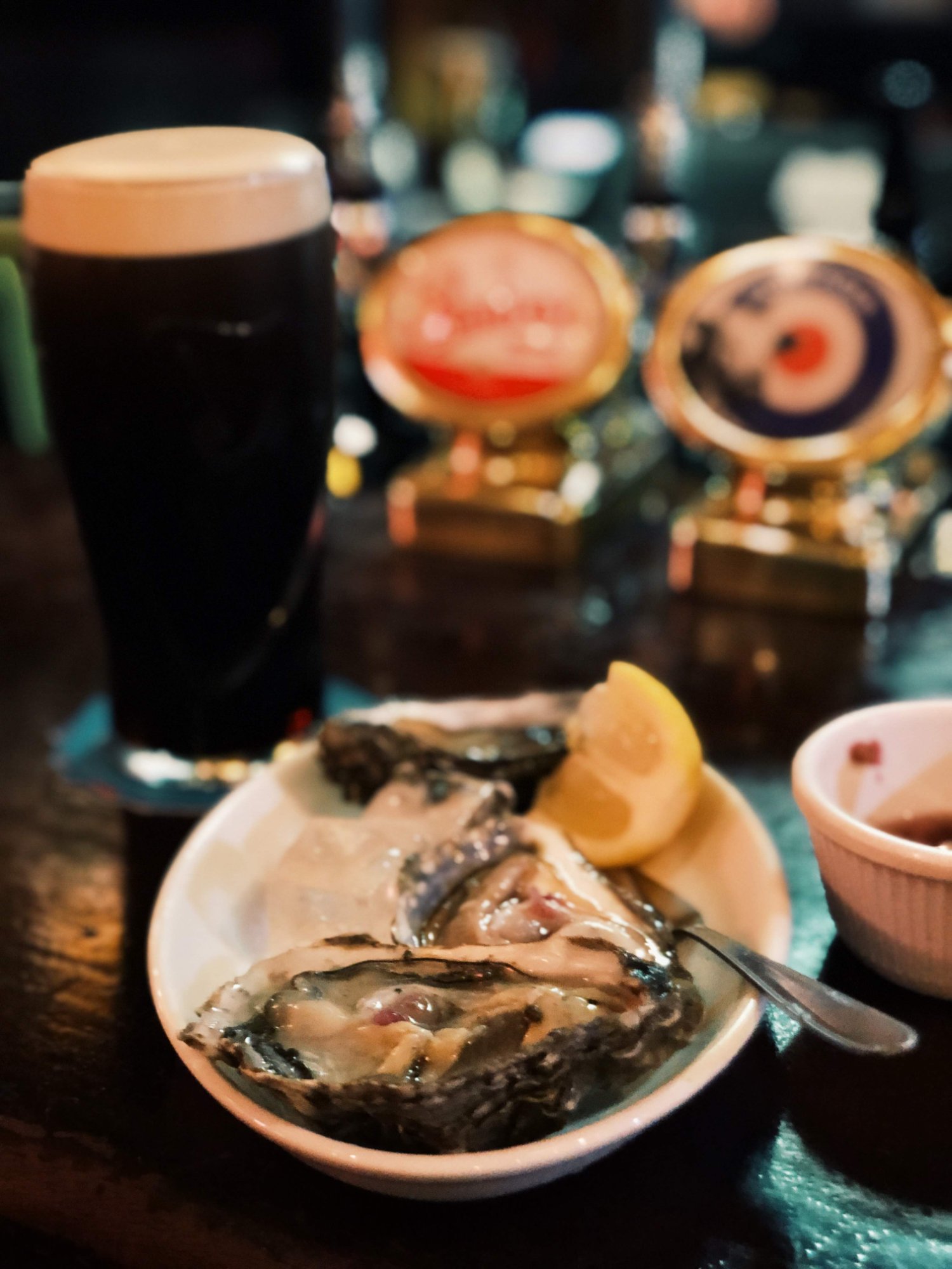 Guinness pint with oysters on ice at The Cow