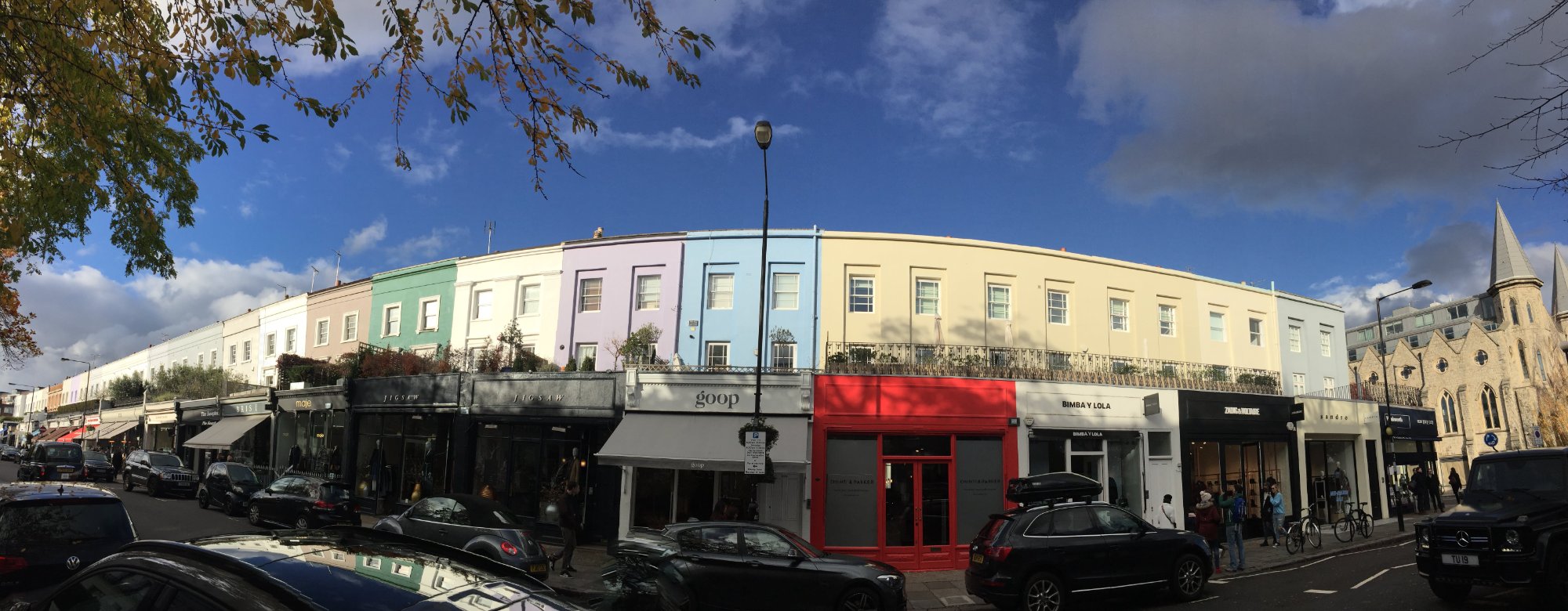 Portobello Road, Notting Hill — pastel houses and autumn sky