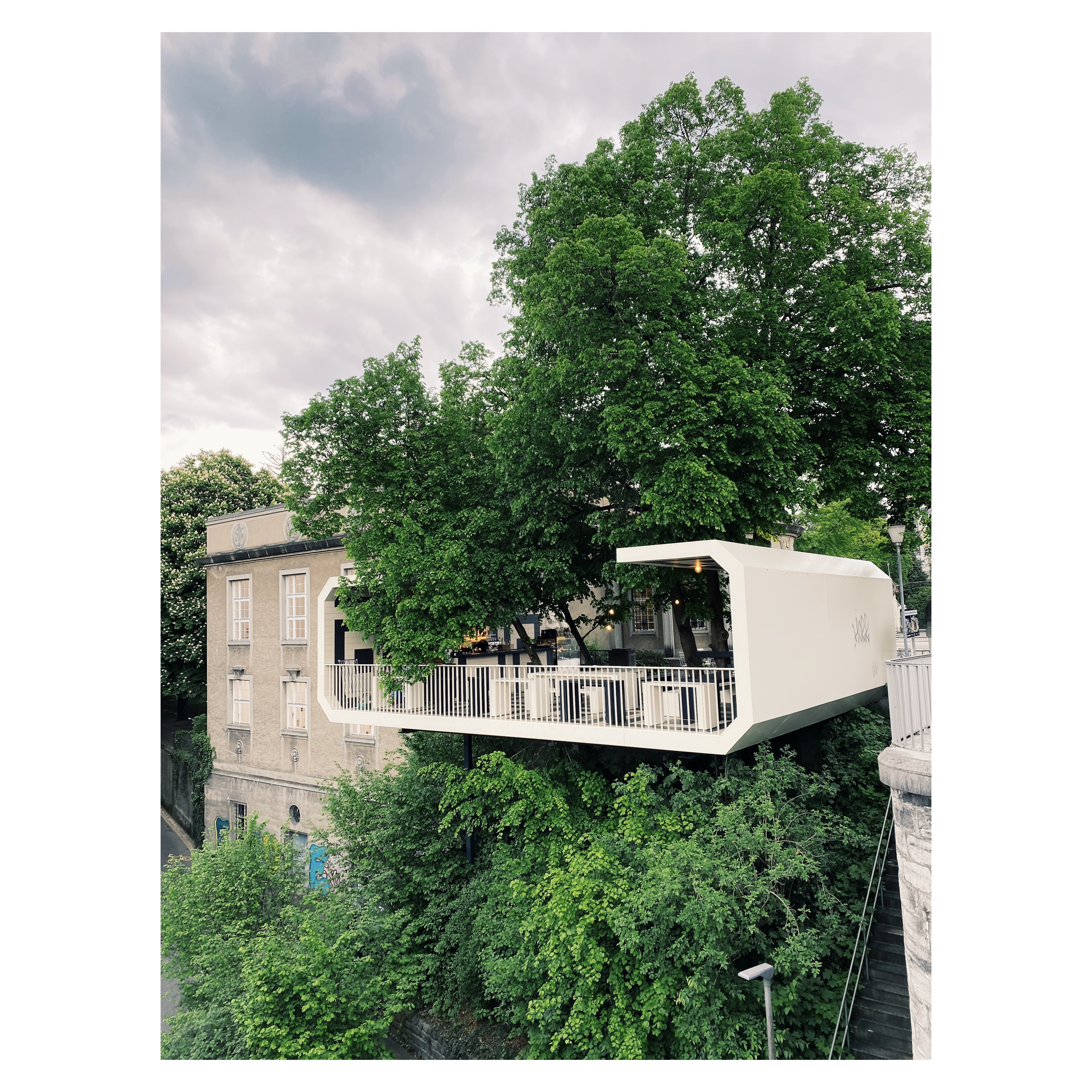 Kunsthalle Bern café, evening light, cantilevered over trees