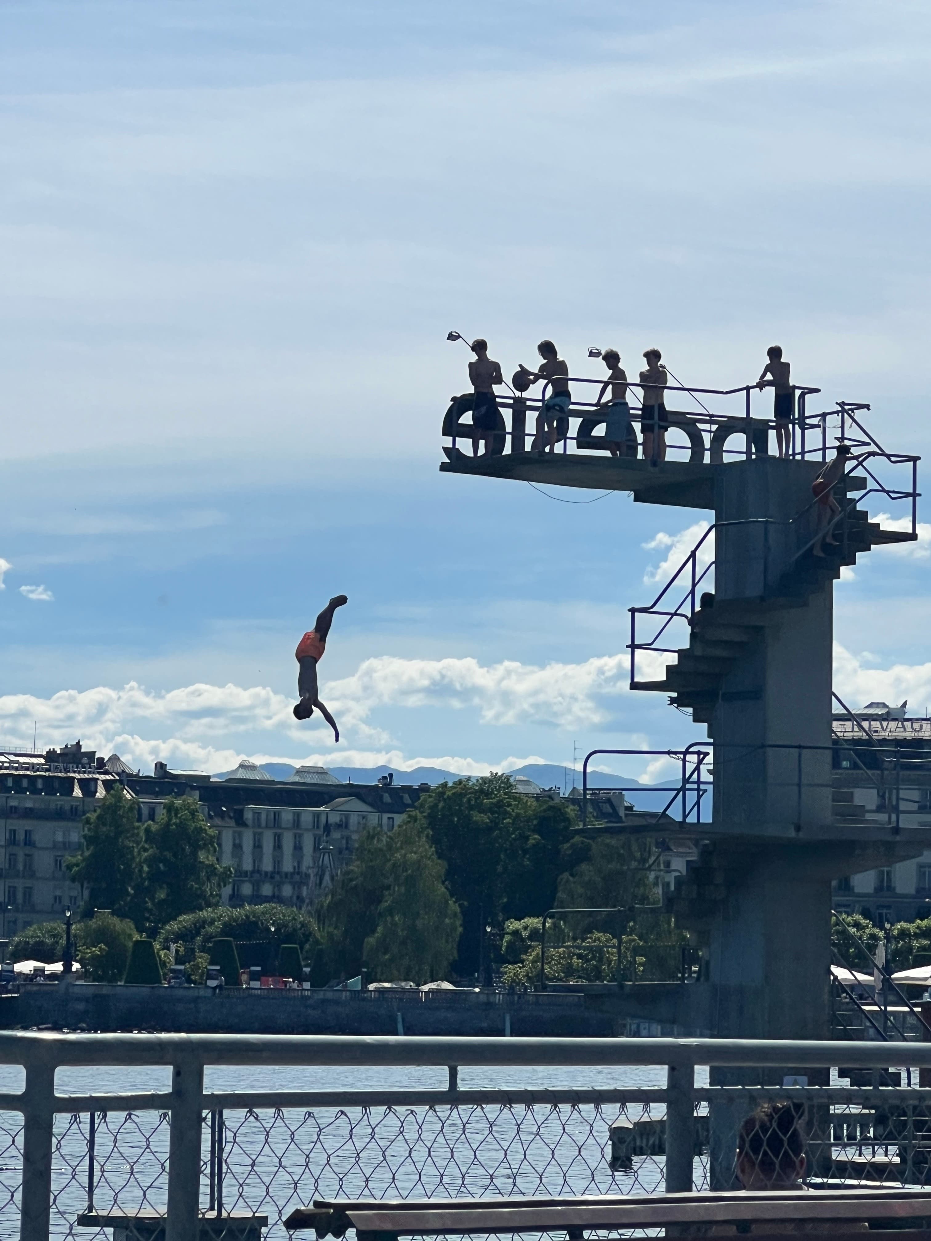 Swimmers and sunbathers at Bains des Pâquis on Lake Geneva