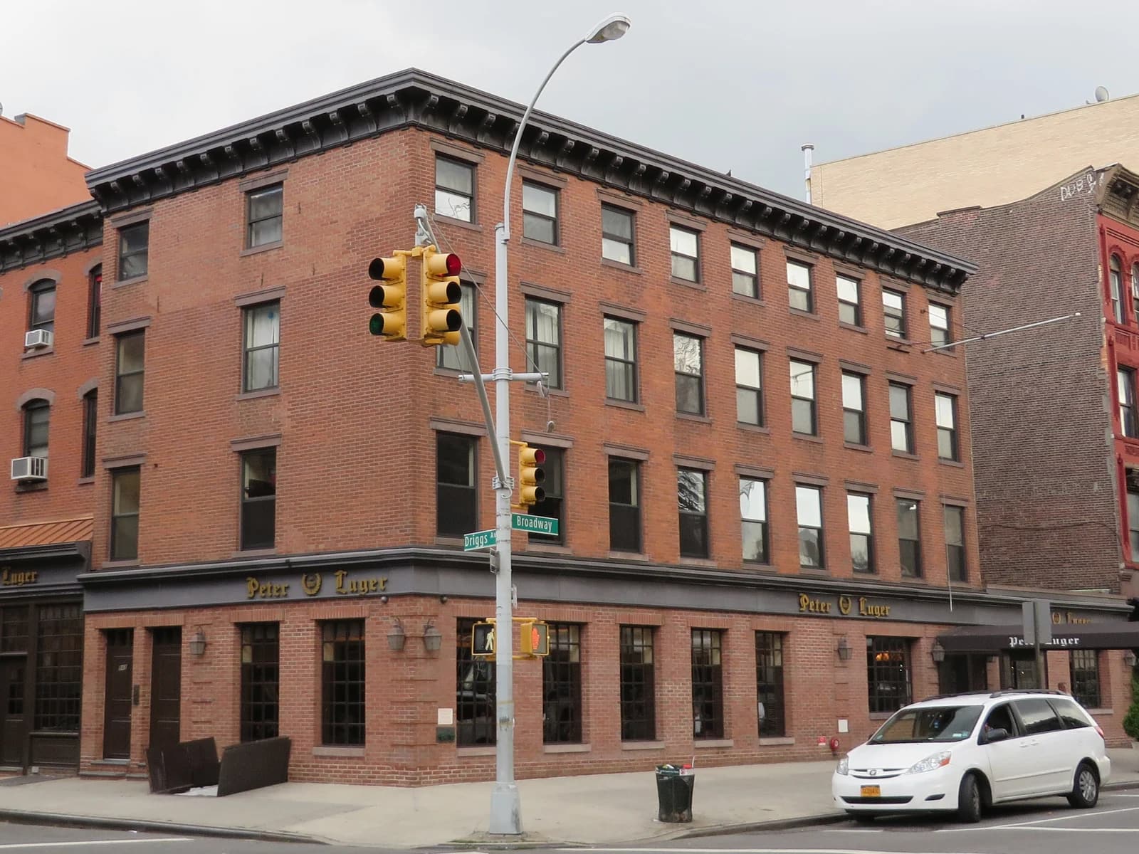Red-brick exterior of Peter Luger Steak House in Williamsburg Brooklyn
