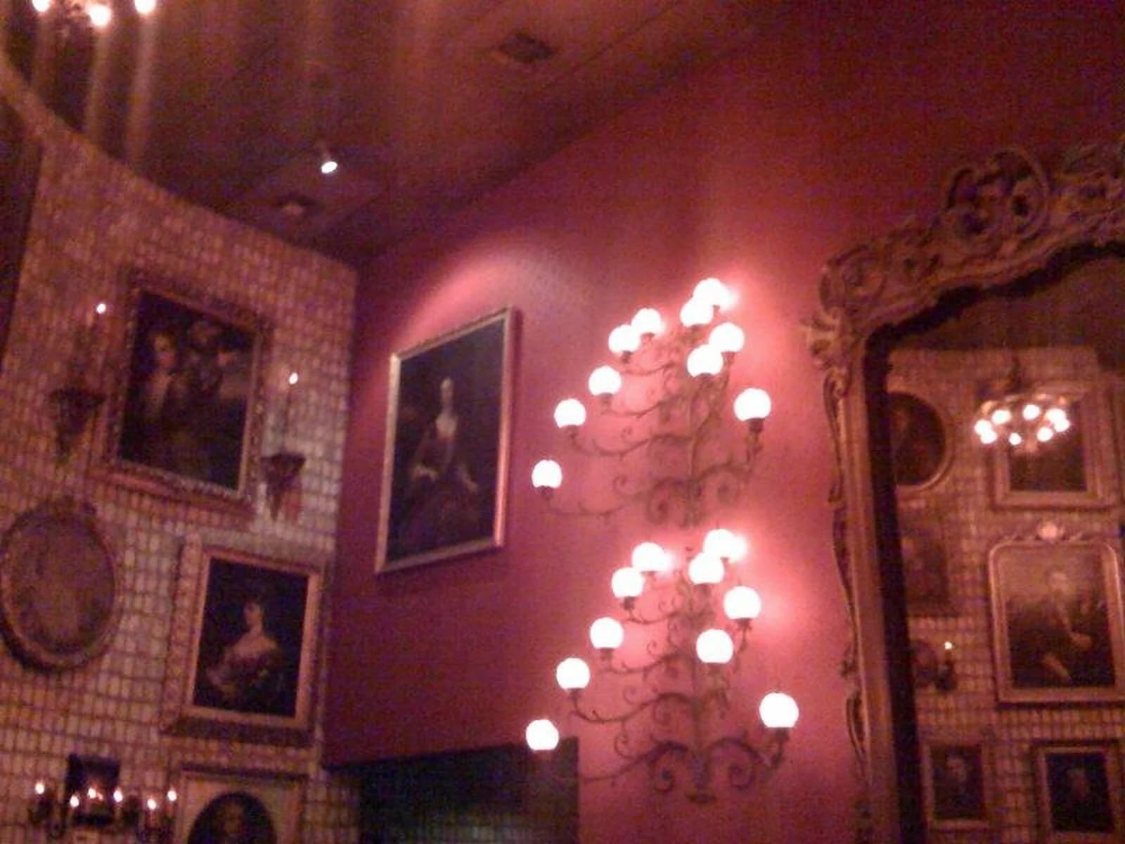 Ornate red dining room inside Bern's Steak House in Tampa