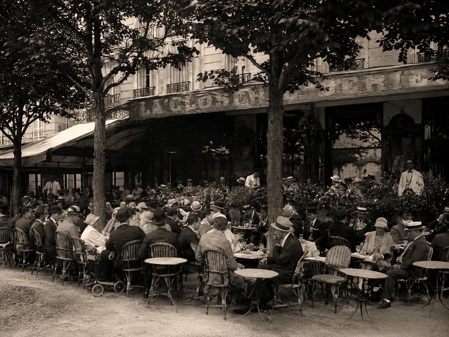 Historic café tables beneath the trees outside La Closerie des Lilas in Paris
