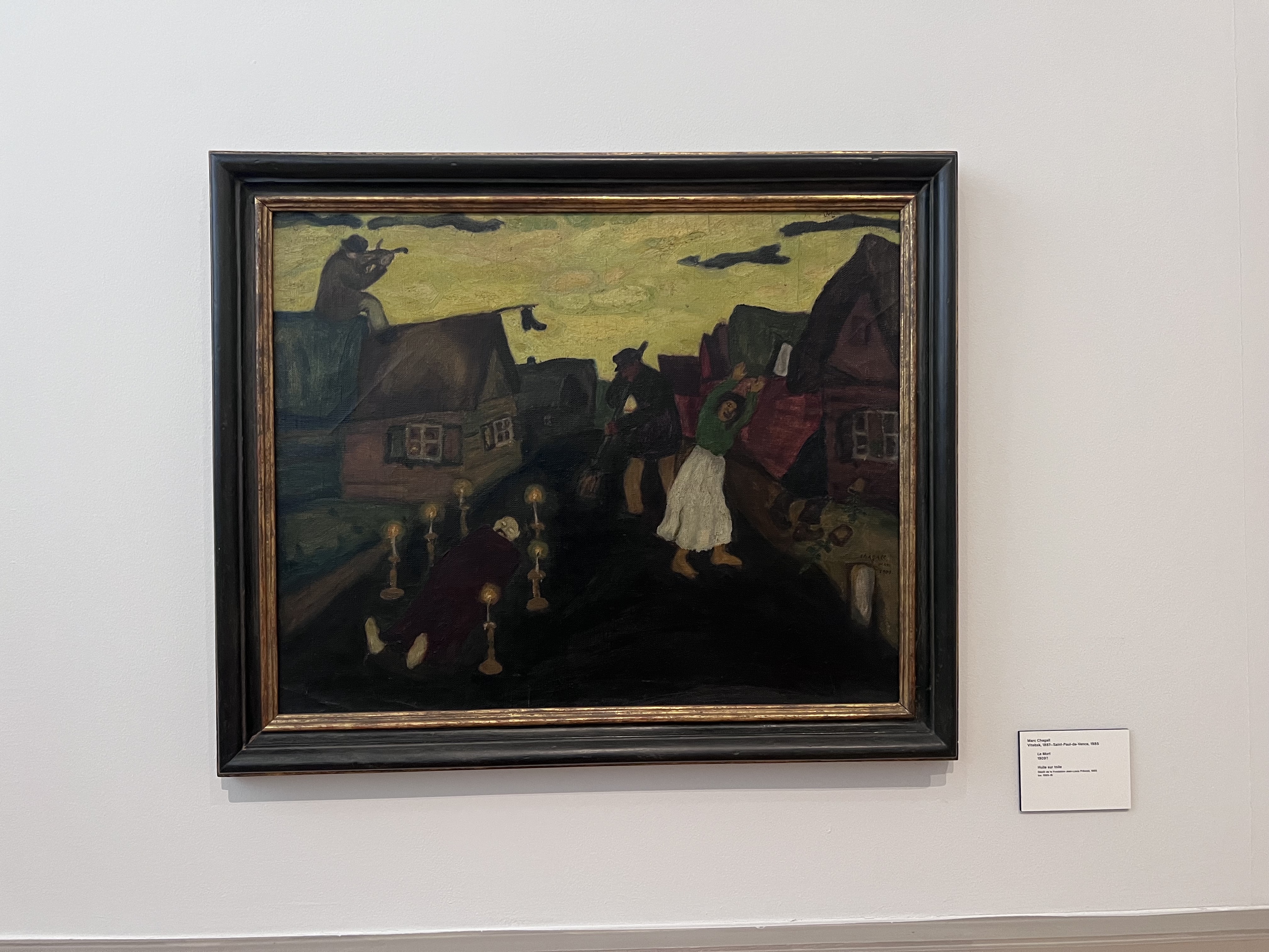 Marc Chagall painting — village night scene with fiddler on roof, candlelight