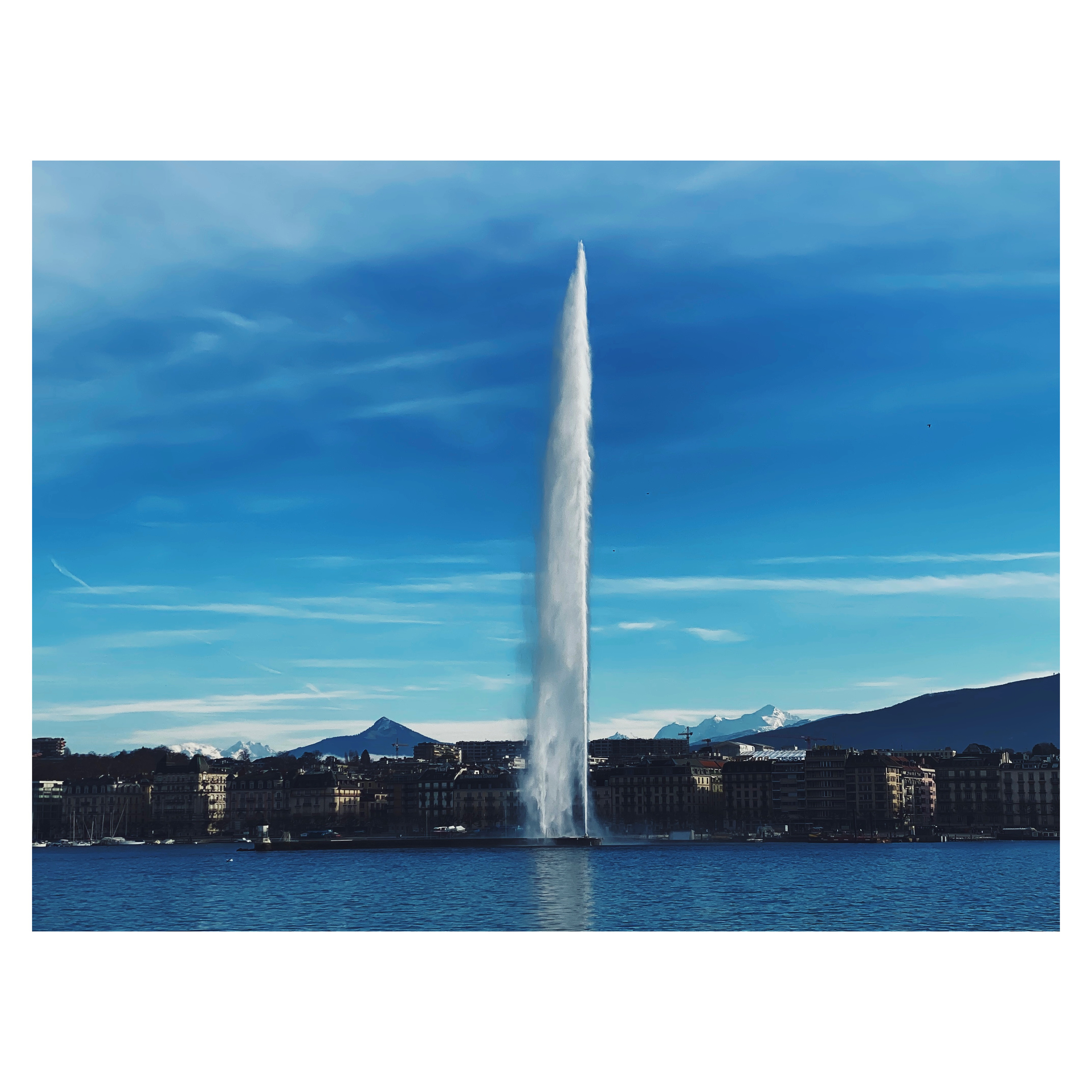 Geneva — Jet d'Eau, the lake, and the Alps