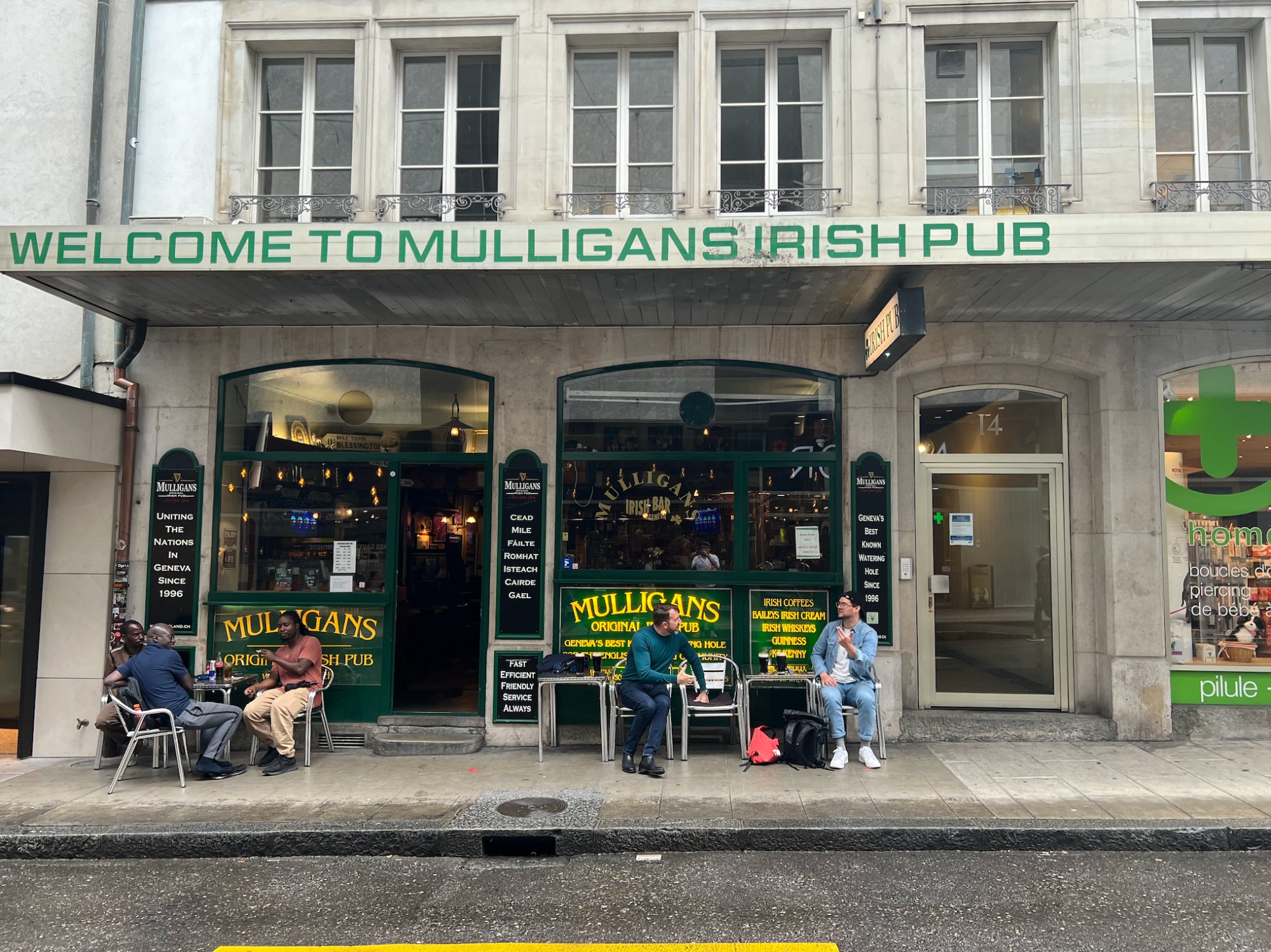 Welcome to Mulligans Irish Pub — full shopfront, Cornavin Geneva