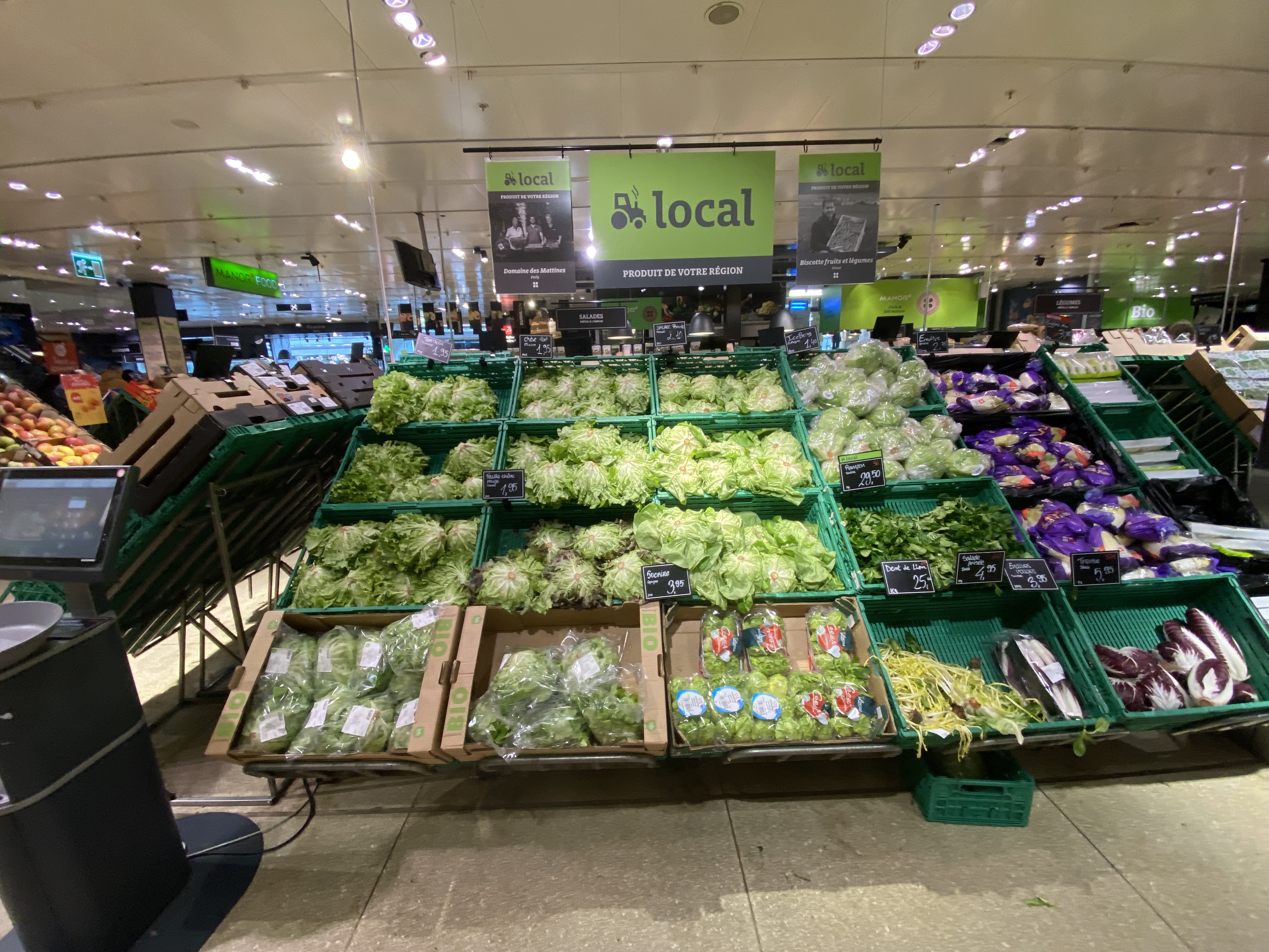 Manor food hall interior — local produce section, Geneva