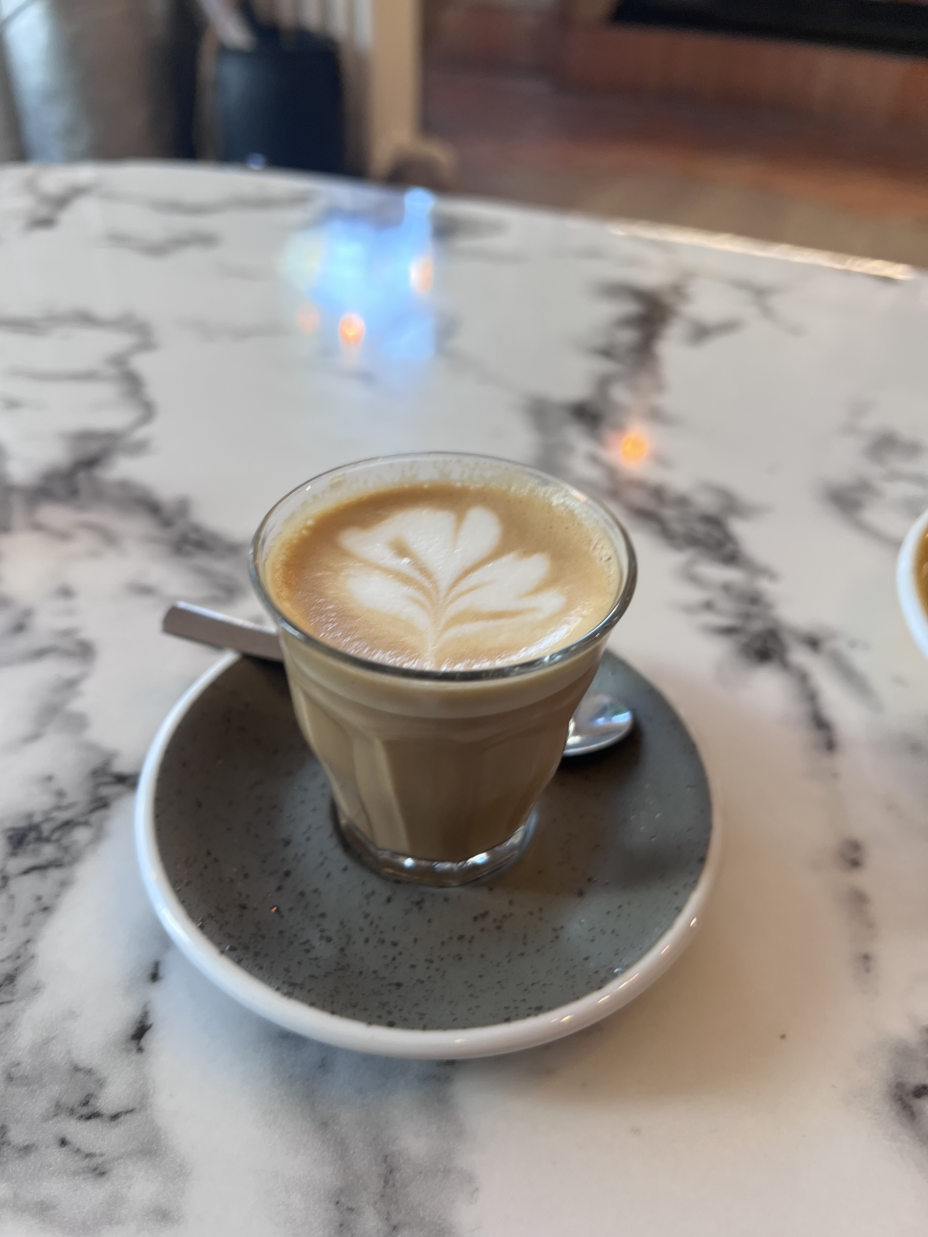 Oh Martine! cortado on marble table, Eaux-Vives Geneva