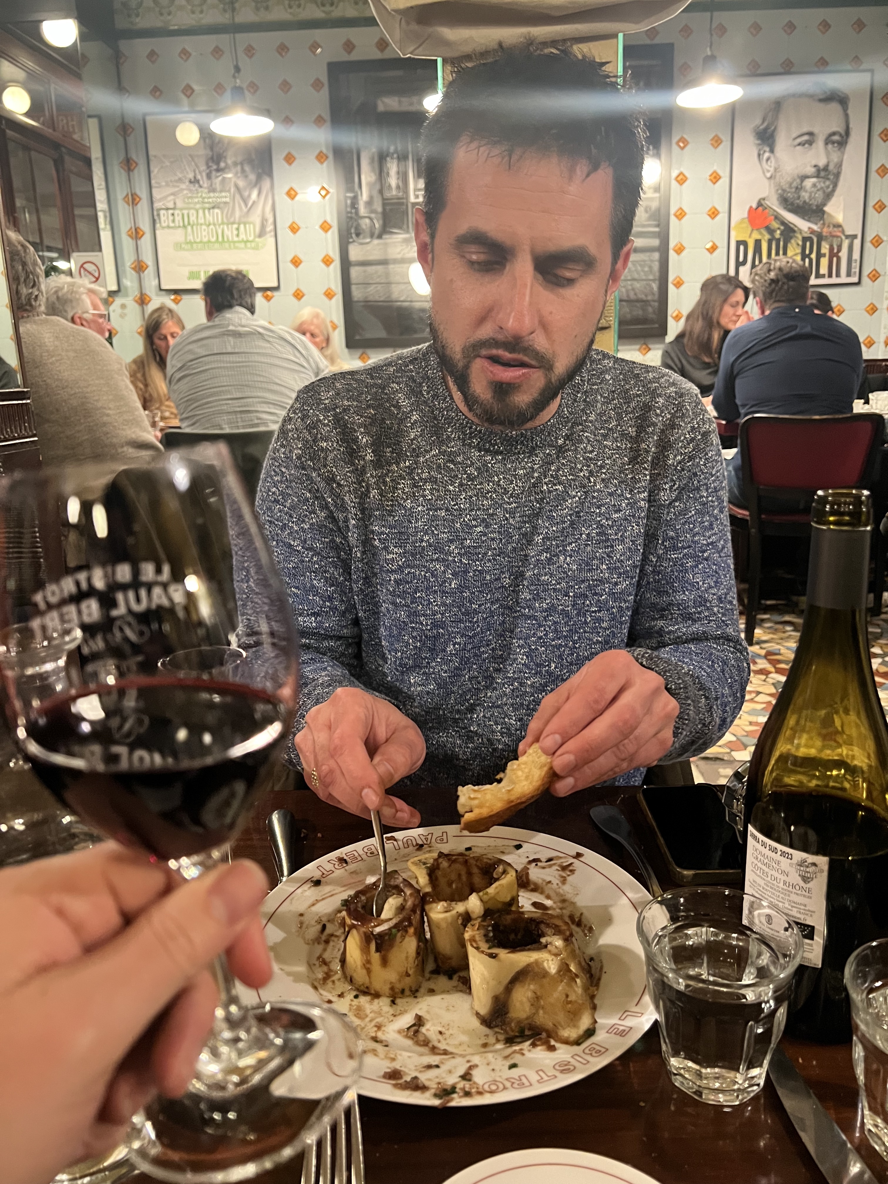 Bone marrow at Paul Bert — bread, red wine, the whole operation