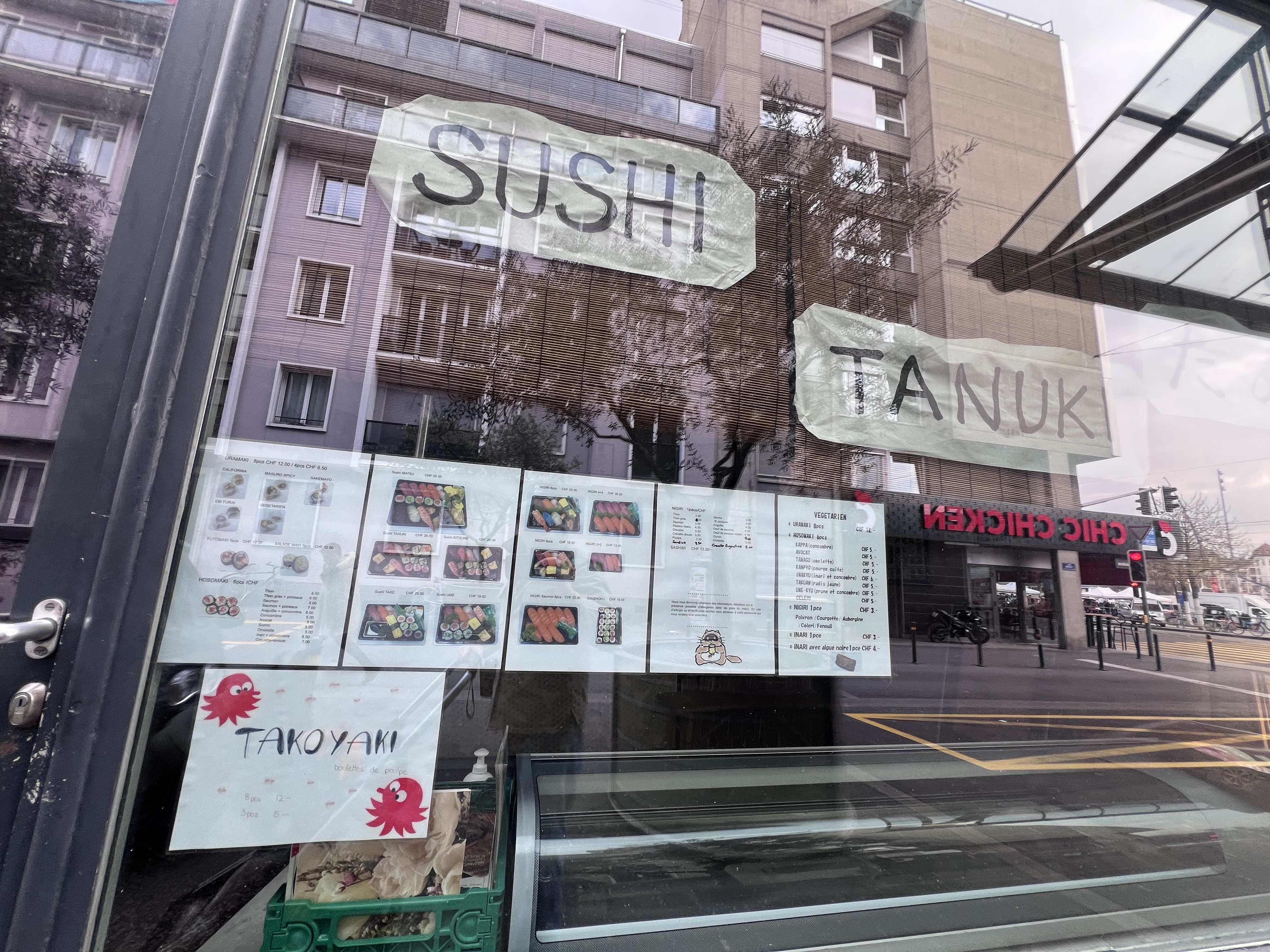 Tanuki window with handwritten signs