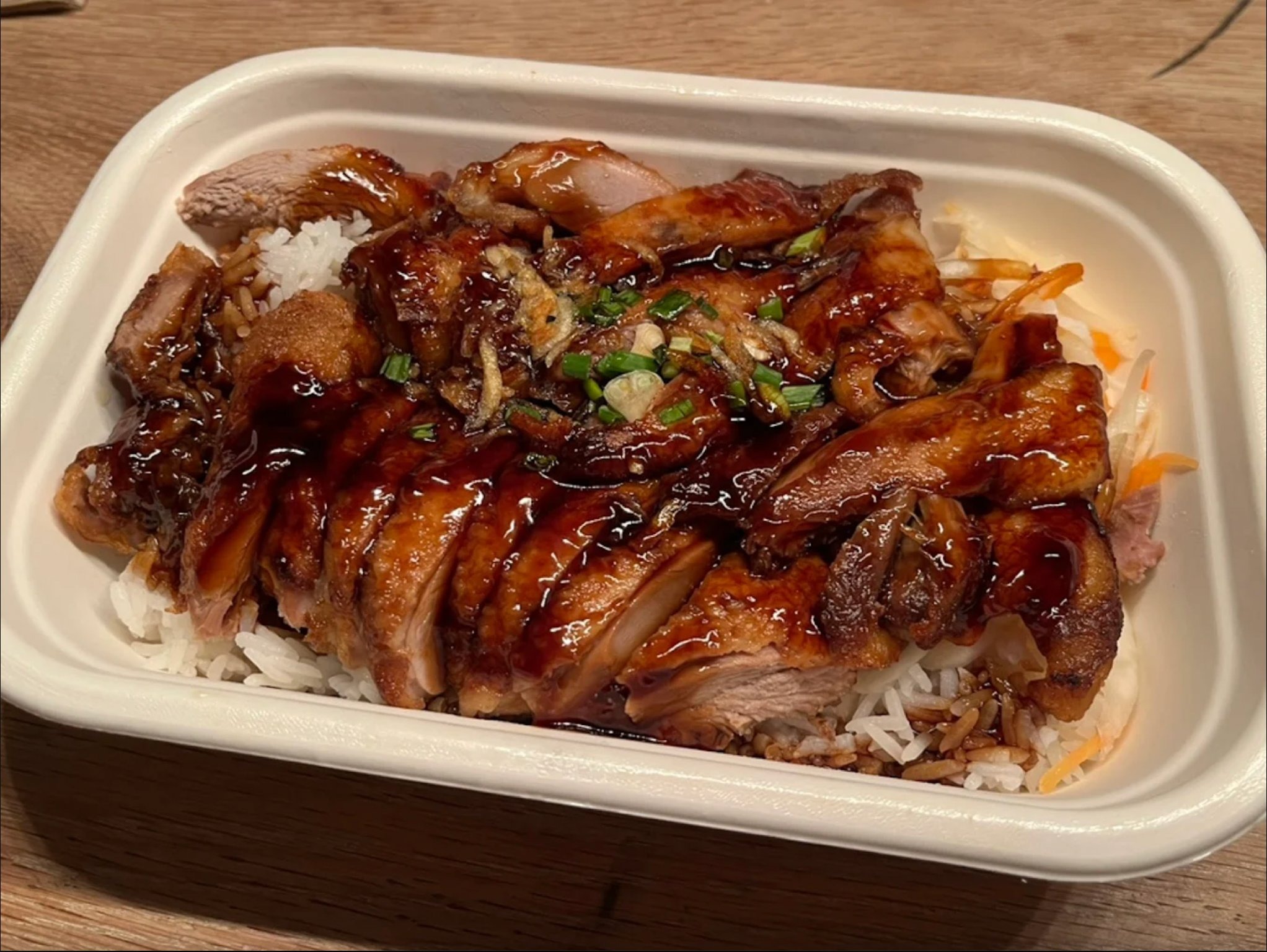 Chicken katsu over rice in takeaway container at Wesley's Kitchen, Zürich